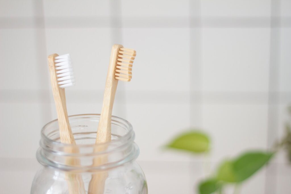 7 Surprising Benefits of Clove Oil for Teeth: Natural Dental Relief and More! 2 two toothbrush in mason jar